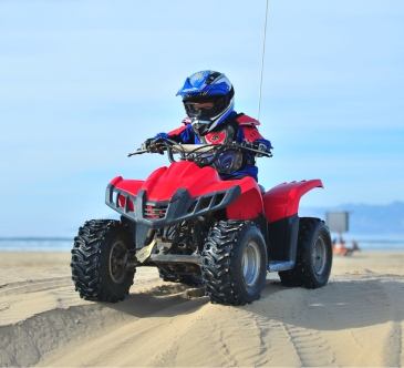Child riding an ATV