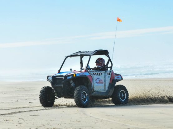 Guest in ATV by the ocean