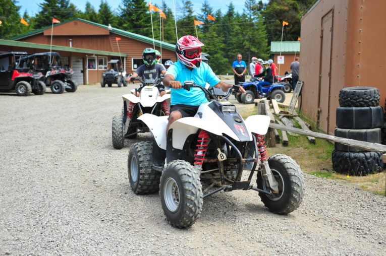 Group of guests riding ATVs in Oregon